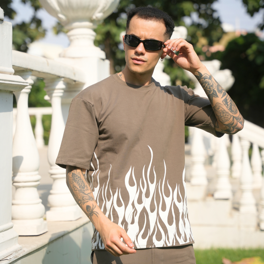 brown t-shirt with white flame design