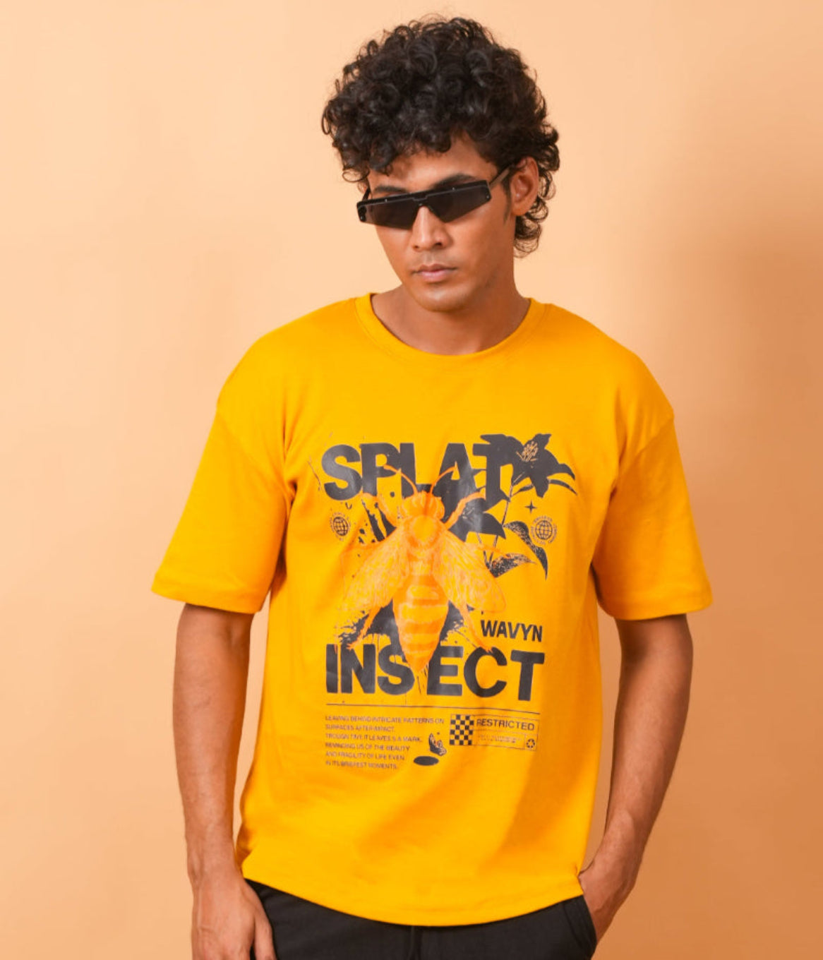 wearing yellow t-shirt