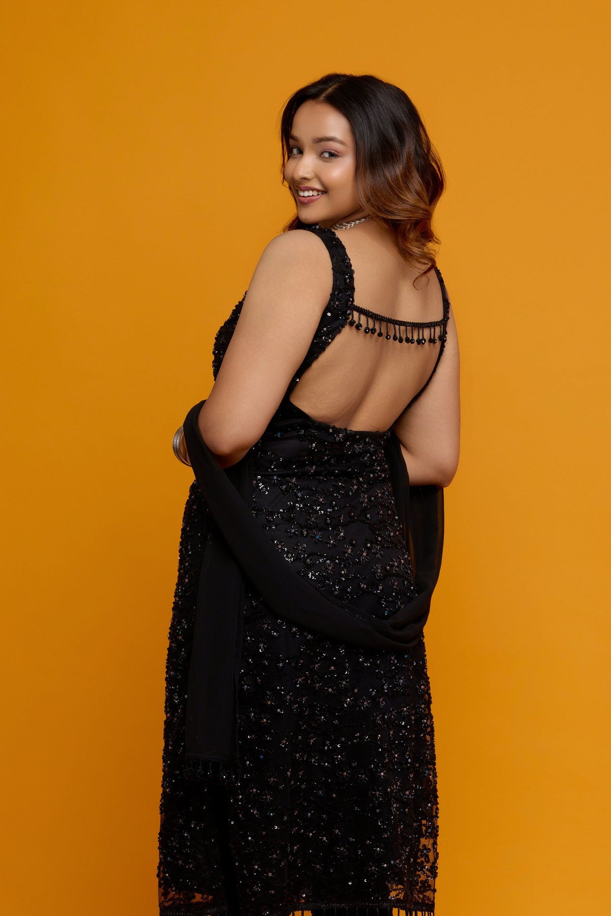 Rajni black sequin and bead kurta with churidar - back view
