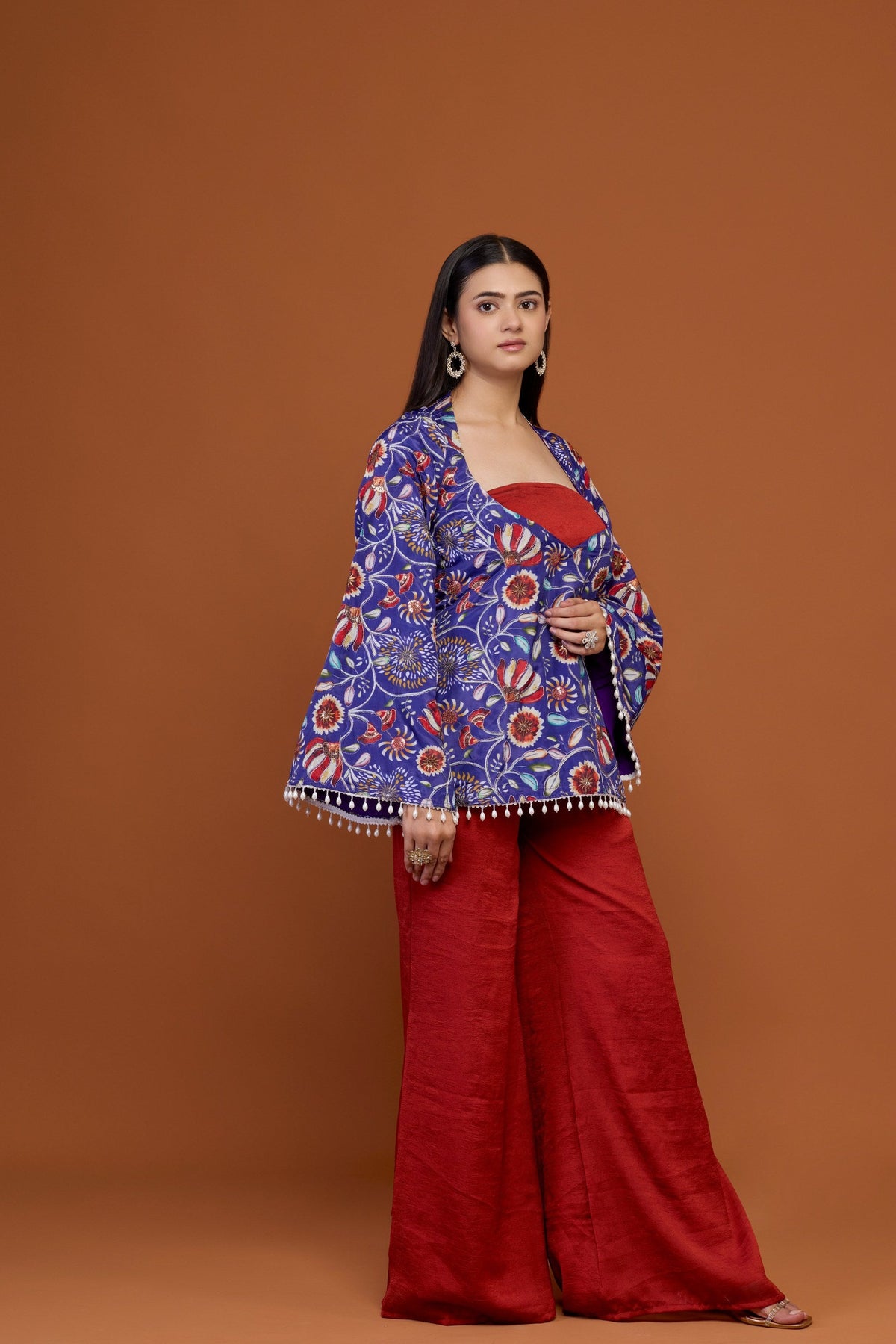 Vasanti blue floral print jacket top with red palazzo set - back view