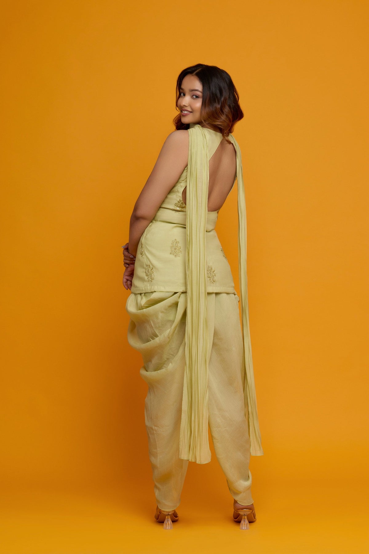 Ziya pistachio green kurti with draped dhoti-style salwar - back view